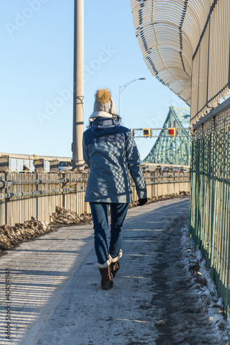 Latin woman walking in Montreal winter
