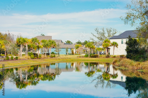 Florida house and pond reflection