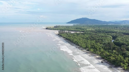 Aerial footage of waves and beach in Borneo