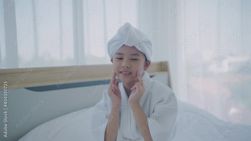 Spa concept of 4k Resolution. A young Asian girl is happy with her complexion. Spa concept of 4k Resolution. A young Asian girl is happy with her complexion.