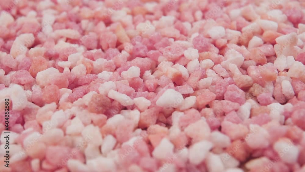Fruit sugar from fruit peel close-up. Crystallized natural candied sweets. Falling crystals. Slow motion. Macro shot Fruit sugar from fruit peel close-up. Crystallized natural candied sweets. Falling crystals. Slow motion. Macro shot