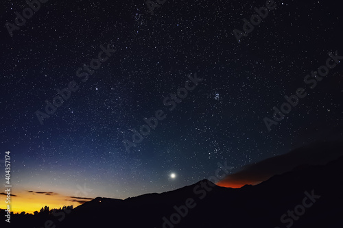 Night sky with universe in Europe Alps.