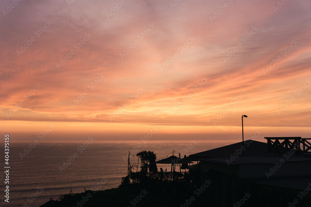 Beautiful sunset in Lima Peru, backlighting of the coast, magenta sky, golden hour Beautiful sunset in Lima Peru, backlighting of the coast, magenta sky, golden hour