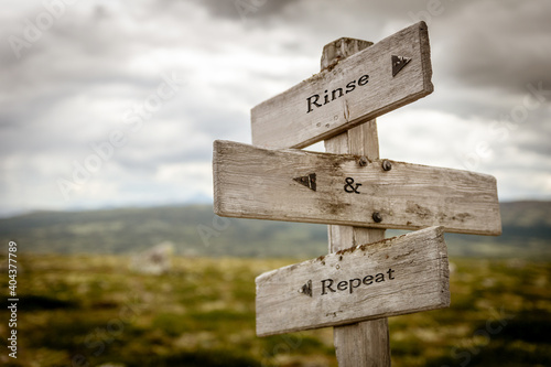 rinse and repeat signpost outdoors in nature