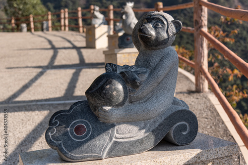 Stone statue of the Year of the Monkey in GuangDong GuanYin mountain national forestpark of china.Sculpture of the Chinese Zodiac.

 photo