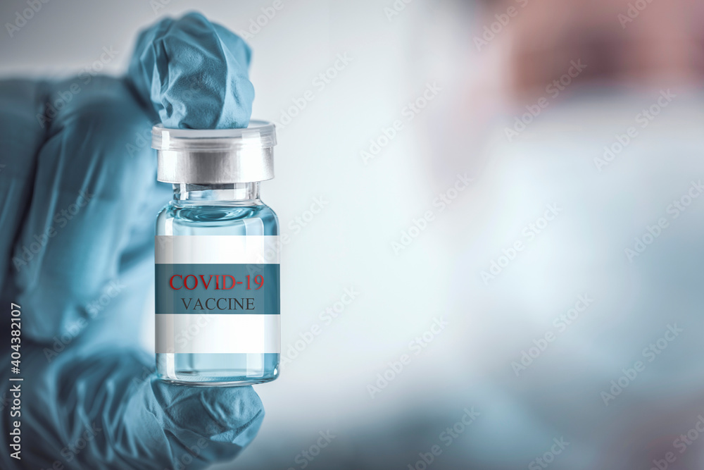 Blue vaccine jar bottle for treatment from corona virus infection and build immunity to viruses Covid-19 , Healthcare And Medical concept. Blue vaccine jar bottle for treatment from corona virus infection and build immunity to viruses Covid-19 , Healthcare And Medical concept.