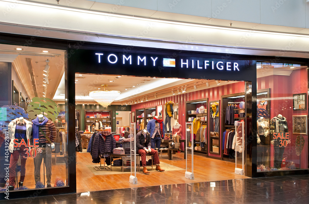 BEIJING, CHINA - JANUARY. 18, 2015: Tommy Hilfiger store. Tommy Hilfiger is  an global apparel and retail company founded in 1985. Stock Photo | Adobe  Stock