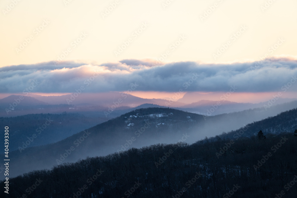 View of Fog Rolling over Mountains from Rough Ridge on the Blue Ridge Parkway at Sunset View of Fog Rolling over Mountains from Rough Ridge on the Blue Ridge Parkway at Sunset