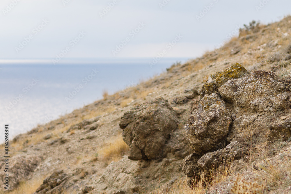 Local tourism in Crimea. Cliffs And Water. Skyes rocks and lochs. Seascape of Cape Fiolent, Crimea. Seascape, beautiful view of the mountains above the sea. Black Sea View at Crimea, Russia, Ukraine. Local tourism in Crimea. Cliffs And Water. Skyes rocks and lochs. Seascape of Cape Fiolent, Crimea. Seascape, beautiful view of the mountains above the sea. Black Sea View at Crimea, Russia, Ukraine.
