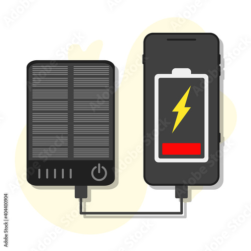mobile phone with low battery indicators is charged from solar charger