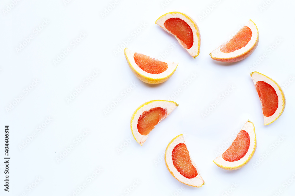 High vitamin C. Juicy grapefruit slices on white. High vitamin C. Juicy grapefruit slices on white.