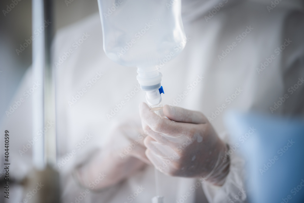 professional doctor and nurse are wearing PPE suit protection and looking for coronavirus covid-19 virus infected patient's in hospital laboratory professional doctor and nurse are wearing PPE suit protection and looking for coronavirus covid-19 virus infected patient's in hospital laboratory