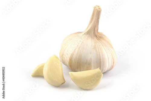 Garlic isolated on a white background. Open the cloves of garlic.