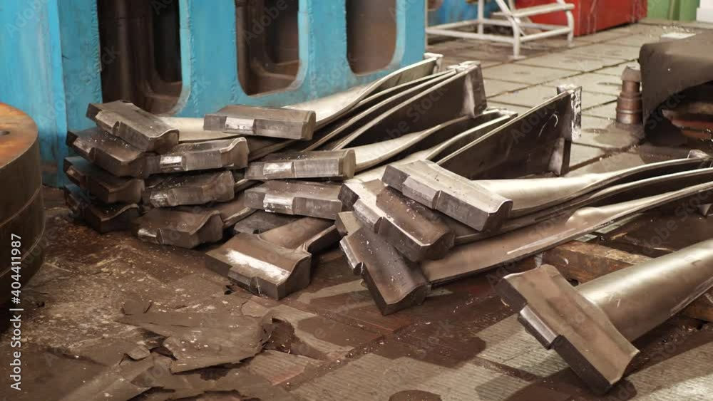 Impulse blades of steam turbine at workshop at metalworking factory Impulse blades of steam turbine at workshop at metalworking factory
