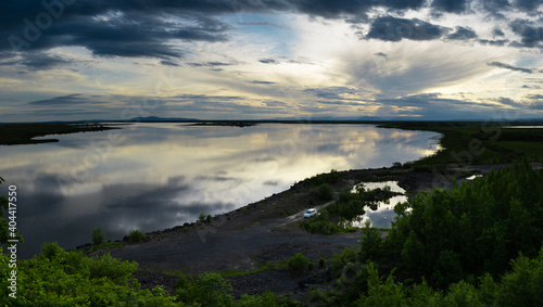 Khabarovsk region. Beautiful sunset on the river named Amur. The Amur River near Ommi near the city of Amursk Khabarovsk krai.