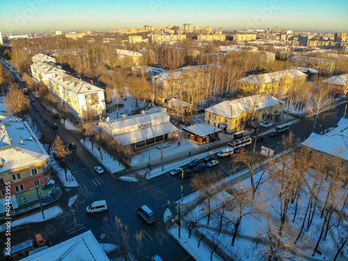 Aerial view of the crossroads of Pugachev and Shchors streets in winter (Kirov, Russia)