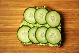 homemade avocado sandwich with tomato or cucumber. Vegetarian breakfast. A healthy snack. High quality photo