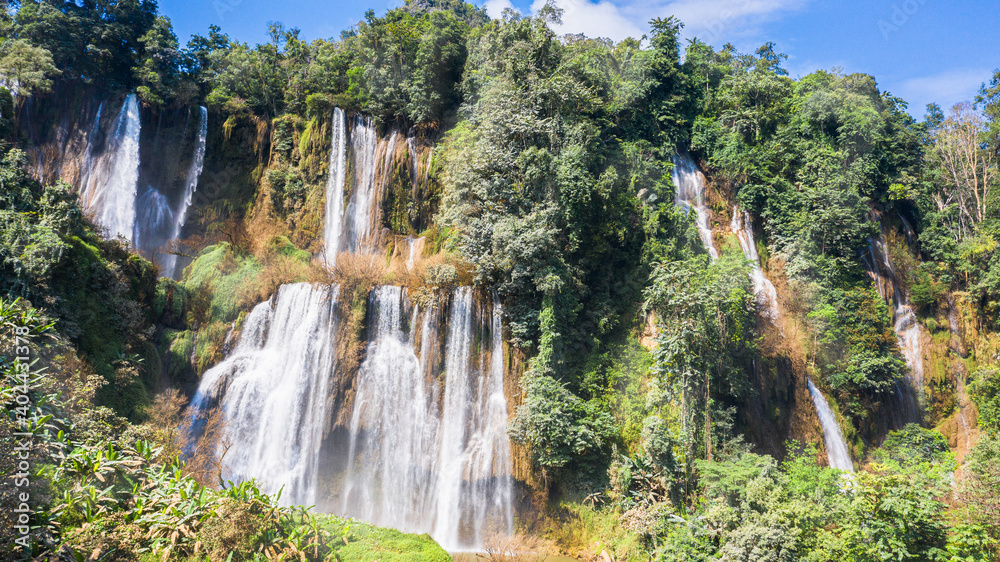 Fototapeta premium Aerial view of Thi Lo Su Waterfall in the morning It is one of the sixth most beautiful waterfalls in the world. The height of the waterfall is 300 meters and 500 meters wide.Nobody.