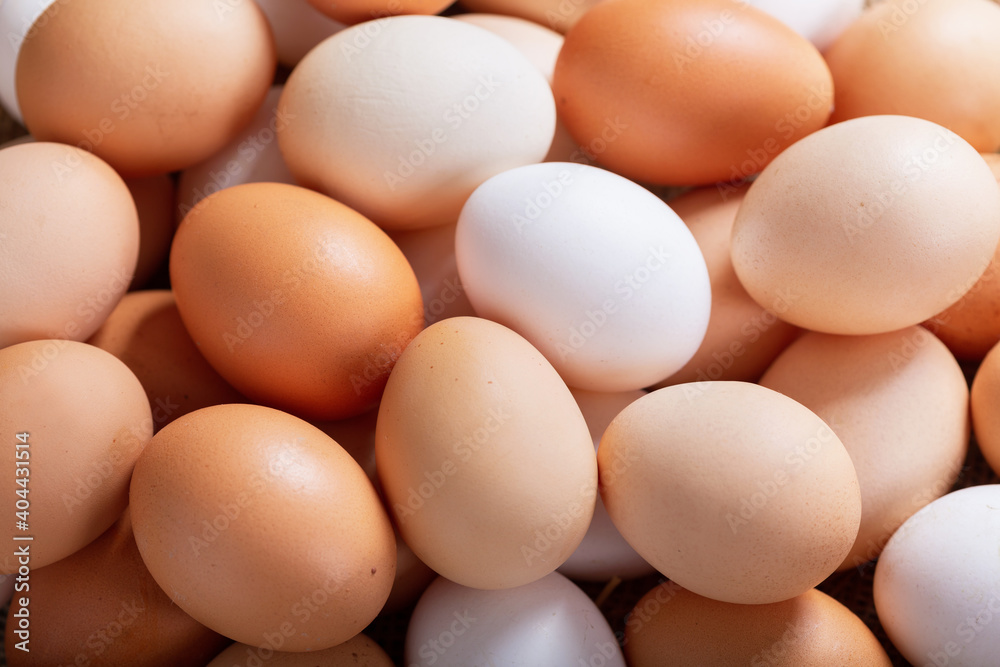 fresh eggs as background, top view