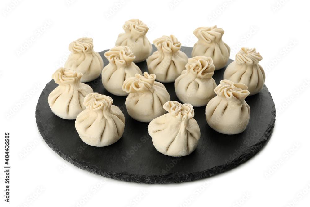 Tray with raw khinkali isolated on white background Tray with raw khinkali isolated on white background
