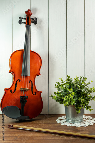 a violin on in wooden table