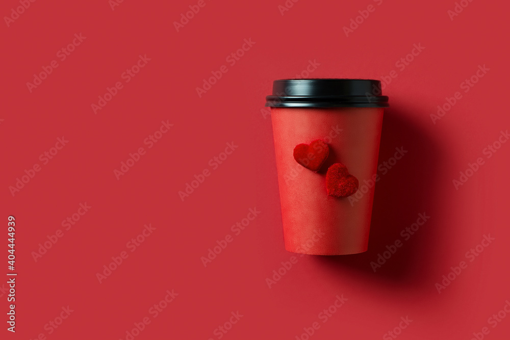 Coffee to go with two hearts on red background, valentines card Coffee to go with two hearts on red background, valentines card