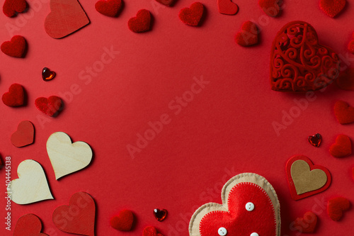 Red hearts pattern valentines card flat lay