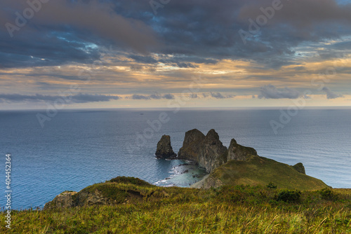 Russia. Far East. Seaside region. Sea of Japan. The area of the village named Olga. Beautiful view of the Sea of Japan from the side of the cape named four cliffs. Four rocks in the evening.