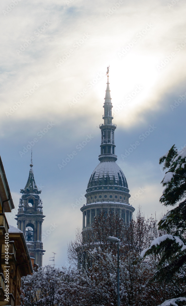 Winter day in Novara, Italy. An unusual snow fall covered the town and the San Gaudenzio dome in white