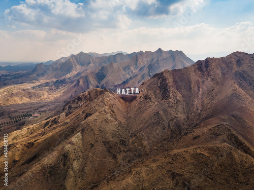 Hatta city sign in Hajar mountains in Hatta enclave of Dubai in the UAE