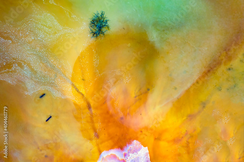 Drone view of contaminated, toxic water stream in Geamana, Romania - colorful abstract background.