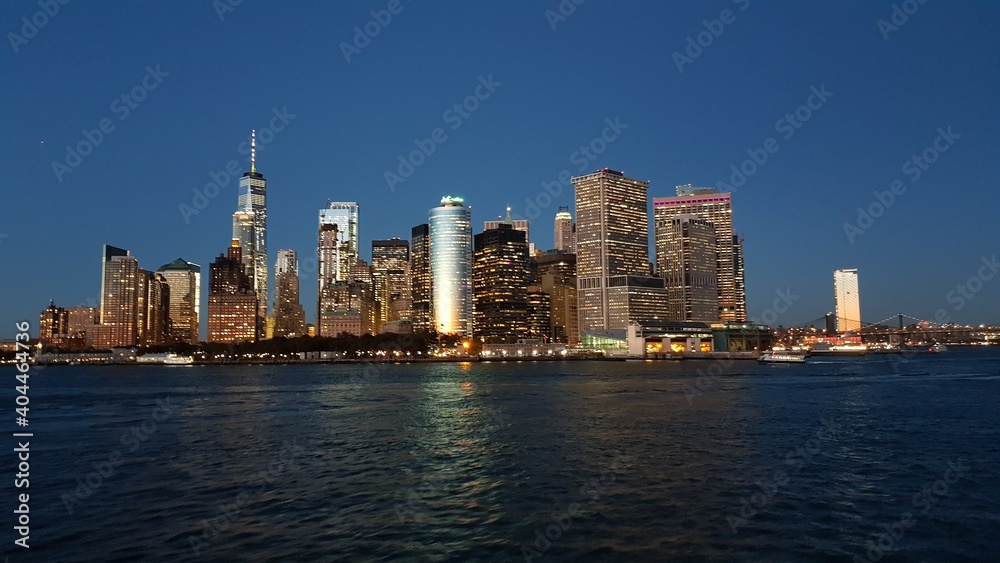 Manhattan financial district from Staten Island Ferry at dusk