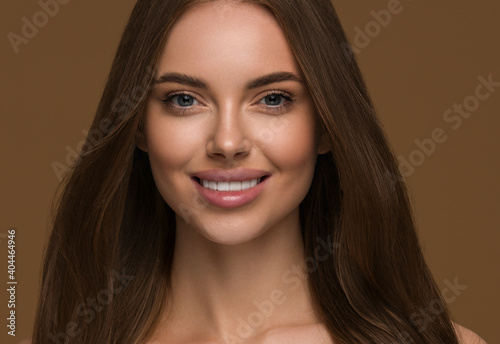 Beautiful teeth smile long hair woman healthy clean skin happy female portrait