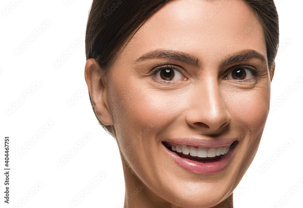 Beautiful woman face healthy teeth smile close up healthy natural skin Beautiful woman face healthy teeth smile close up healthy natural skin