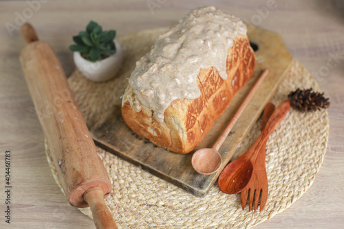 Homemade whole wheat bread with peanut butter on top