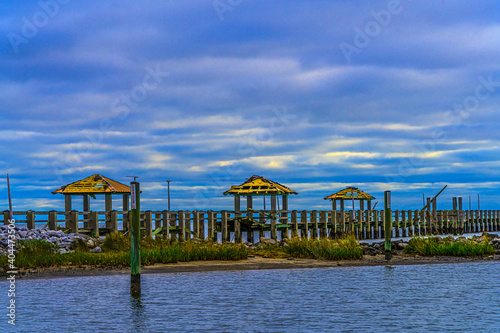 Pass Christian Mississippi seaside picnic area damaged in Hurricane with emphatic clouds. 