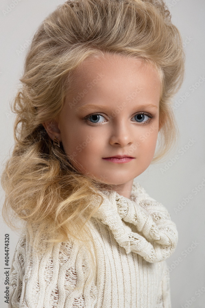 portrait of a girl child with beautiful hair on a white background portrait of a girl child with beautiful hair on a white background