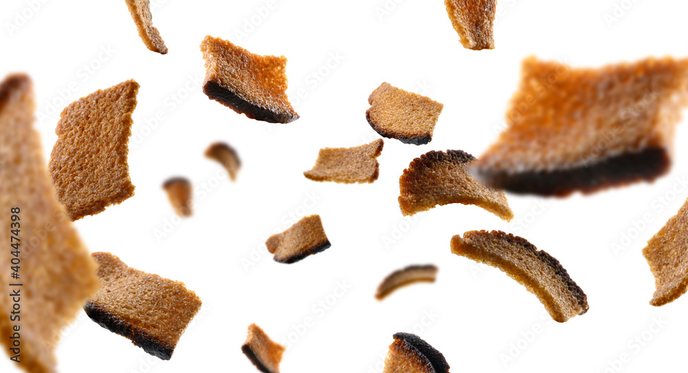 Rye croutons levitate on a white background