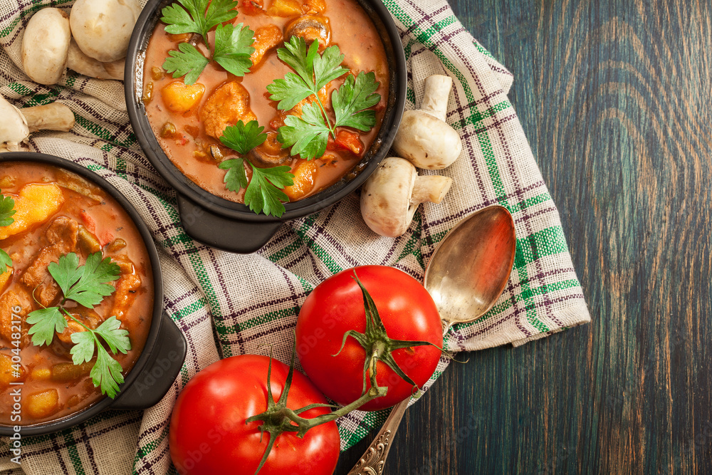 Stew soup with meat, potatoes, mushrooms and red pepper Stew soup with meat, potatoes, mushrooms and red pepper