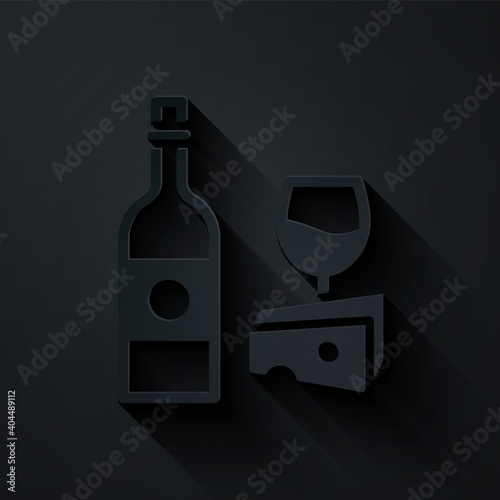 Paper cut Wine bottle with glass and cheese icon isolated on black background. Romantic dinner. Paper art style. Vector.