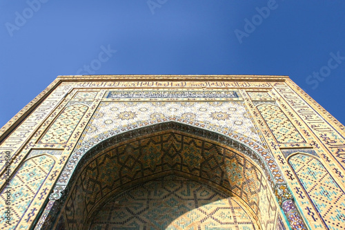 Samarkand, Uzbekistan - November, 14 2019: The Registan square building complex.The ancient city is part of UNESCO World. The Ulugh Beg Madrasah on historic Registan Square