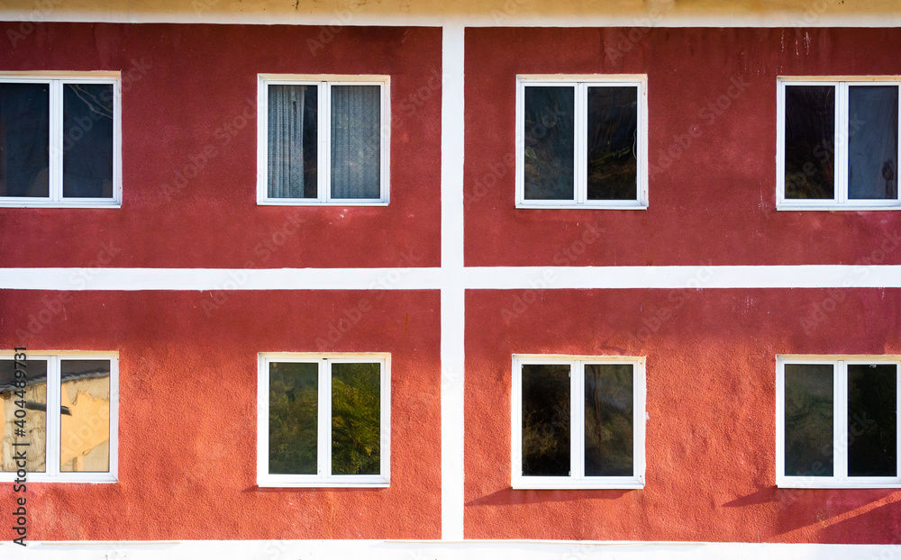 windows of an red building like swiss flag