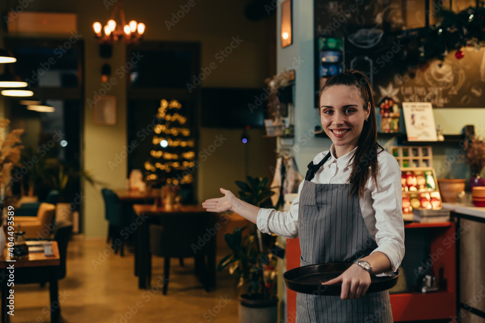 woman waitress posing in cafeteria
