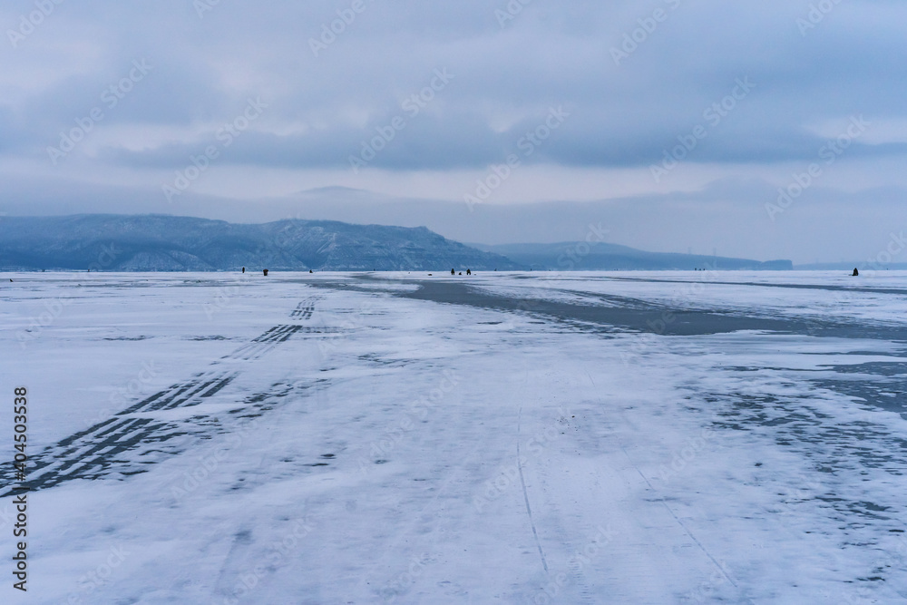 Frozen winter river Volga on a cloudy day