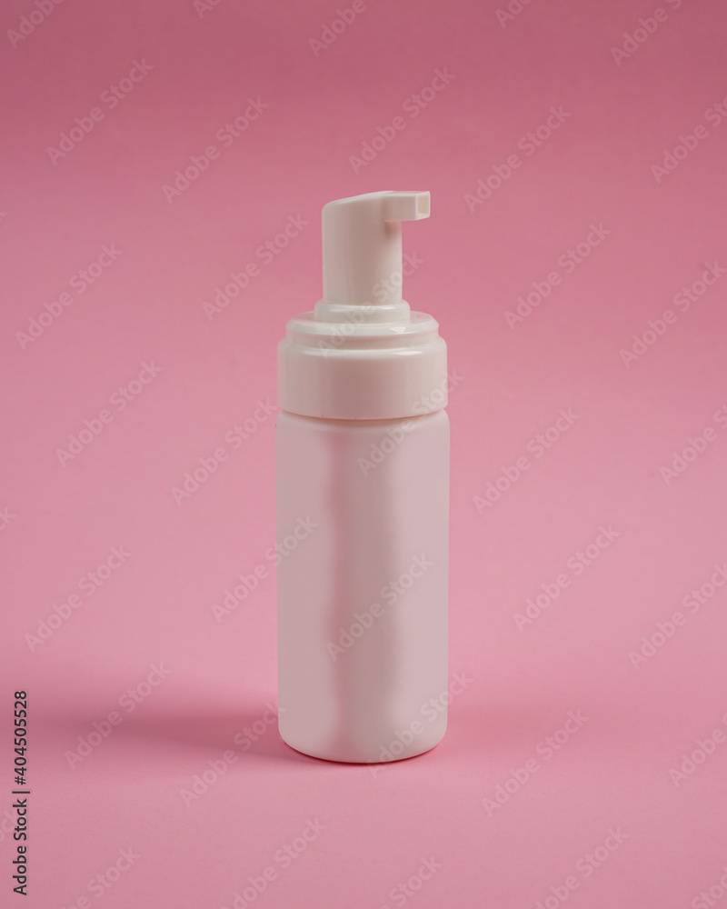 Soap bottles with pump mockup isolated on pink background. Cosmetic plastic bottle with different caps (spray, dispenser pump). Liquid container for gel, lotion, cream, shampoo, bath foam. Soap bottles with pump mockup isolated on pink background. Cosmetic plastic bottle with different caps (spray, dispenser pump). Liquid container for gel, lotion, cream, shampoo, bath foam.