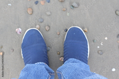 Man shoes jeans denim on the beach  © Exunta