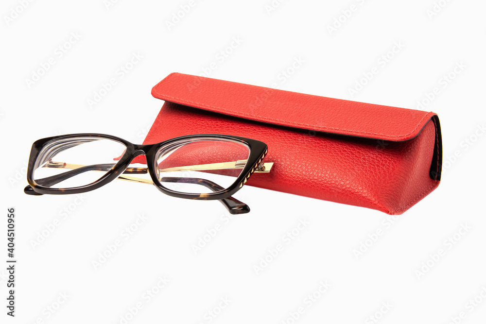 Rectangular plastic oversized eyeglasses with red glasses leather case isolated on a white background Rectangular plastic oversized eyeglasses with red glasses leather case isolated on a white background
