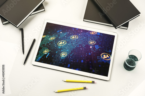 Top view of modern digital tablet screen with social network icons concept and world map. Networking concept. 3D Rendering