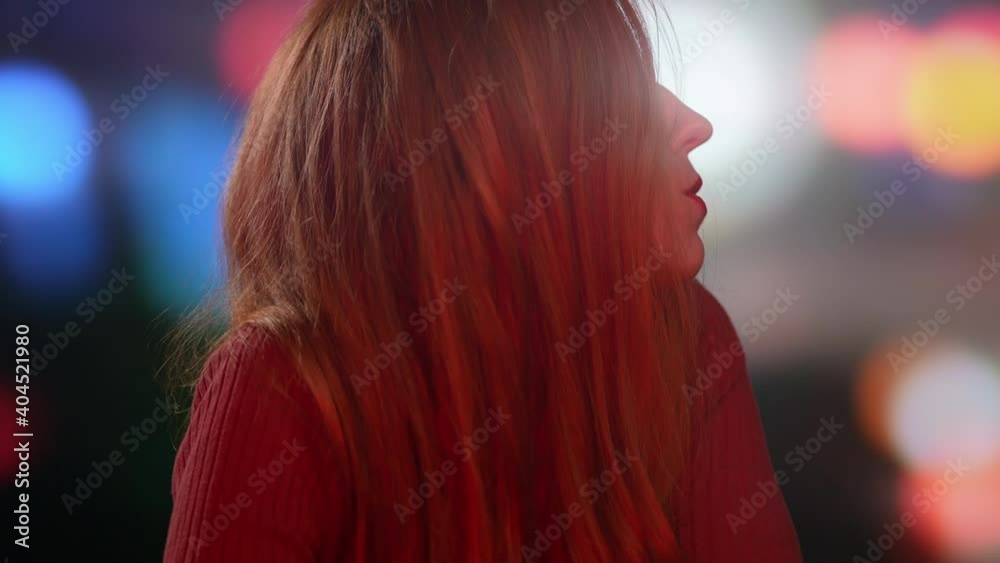 Frightened redhead looks back at car accident she cause surrounded by police lights Frightened redhead looks back at car accident she cause surrounded by police lights
