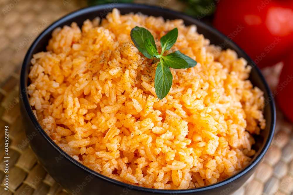 Traditional delicious Turkish food; rice pilaf with tomatoes (Turkish name; Domatesli pirinc pilavi) Traditional delicious Turkish food; rice pilaf with tomatoes (Turkish name; Domatesli pirinc pilavi)